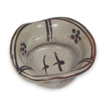 Mukōzuke bowl with design of birds in flight and umebachi crests, E-garatsu type