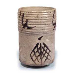 Cylindrical mukōzuke bowl with design of fishing-net dried on shore, E-garatsu type