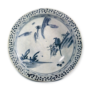 Large bowl with design of landscape with hawk, blue and white