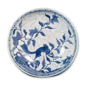 Large bowl with grape and squirrel design, blue and white