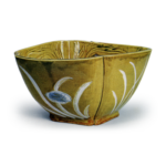 Deep bowl with flowering grass design, iron brown glaze, underglaze blue and white on reserved area