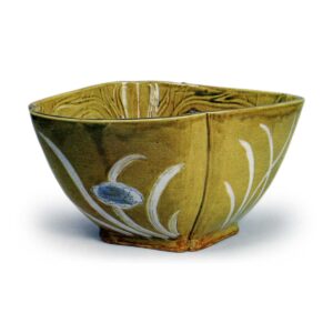 Deep bowl with flowering grass design, iron brown glaze, underglaze blue and white on reserved area