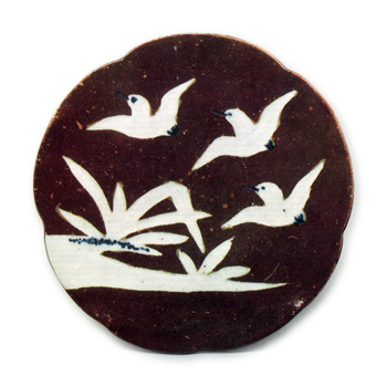 Small dish with plover design, iron brown glaze