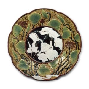 Dish on three legs with heron design, iron brown and celadon glazes,underglaze blue and white on reserved area