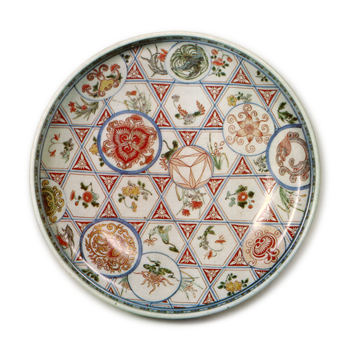 Top-shaped bowl with design of roundels against basket-work ground,