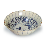 Large chrysanthemum-shaped bowl with grape design,