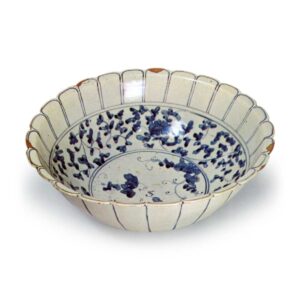 Large chrysanthemum-shaped bowl with grape design,