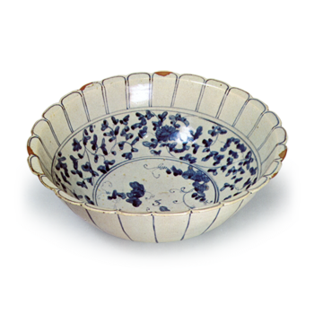 Large chrysanthemum-shaped bowl with grape design,