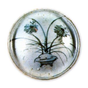 Dish with flowering grass design,