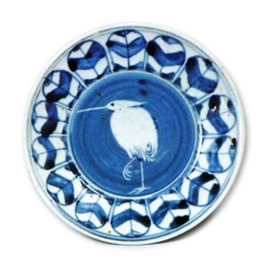 Dish with design of herons and hawk's feathers,