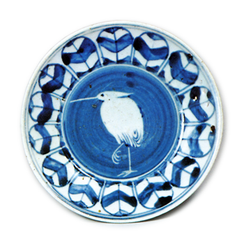 Dish with design of herons and hawk's feathers,