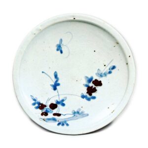 Dish with flowering grass and butterfly design,