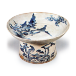 Bowl on foot with landscape and bird design,