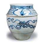 Jar with scrolling grass design,