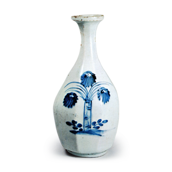 Faced wine bottle with chrysanthemum design,