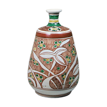 Wine bottle with water plantain design, enamelled ware