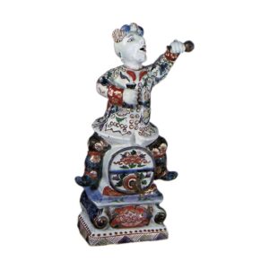 Wine jar with figure of man mounting on cask, enamelled ware