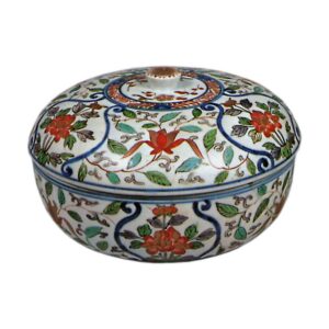 Covered bowl with scrolling grass design, enamelled ware