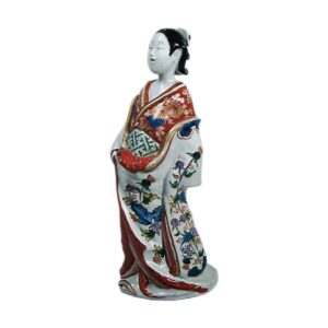 Figure of woman, enamelled ware