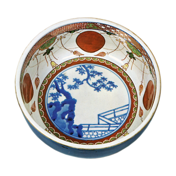Bowl with red roundel design on inside, dark blue glaze on outside, enamelled ware