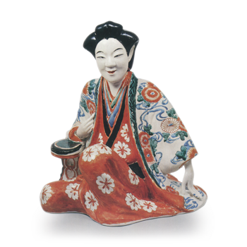 Figure of a seated woman, enamelled ware