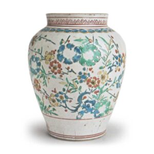 Jar with plum design, enamelled ware