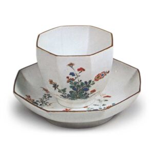 Cup and saucer with autumn grass design, enamelled ware