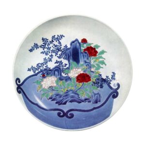 Dish with design of flower pot with peonies and treesaround rocks. enamelled ware