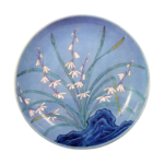 Dish with white orchid design. enamelled ware