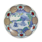 Dish with design of men playing koto. enamelled ware