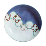 Dish on three legs with design of circles linked by quarterfoils. enamelled ware