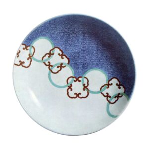 Dish on three legs with design of circles linked by quarterfoils. enamelled ware