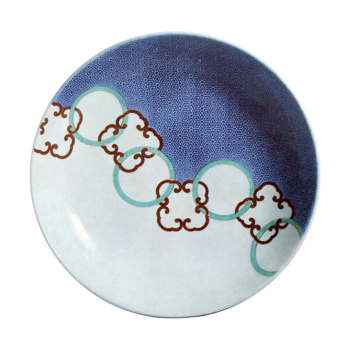 Dish on three legs with design of circles linked by quarterfoils. enamelled ware