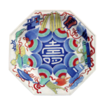 Octagonal dish with design of "various treasures" aroundcharacter kotobuki ("Congratulations"). enamelled ware