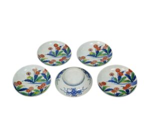 Five dishes with dandelion design. enamelled ware