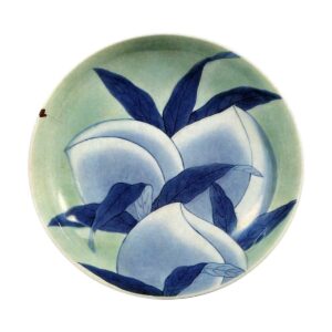 Dish with peach design. celadon glaze.and blue and white