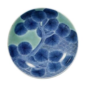 Dish with pine-tree design. celadon glaze.  and blue and white