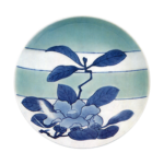 Dish with cameilia design. celadon glaze. and blu. and white