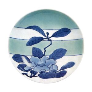 Dish with cameilia design. celadon glaze. and blu. and white