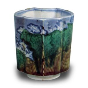 Wine cup with macaw design. enamelled ware