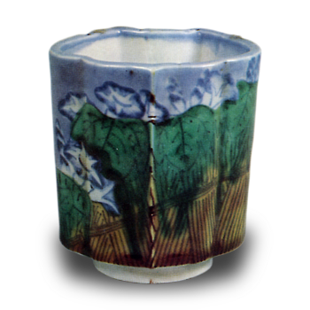 Wine cup with macaw design. enamelled ware
