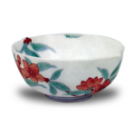 Cup with peach blossom design. enamelled ware