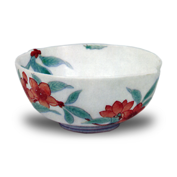 Cup with peach blossom design. enamelled ware