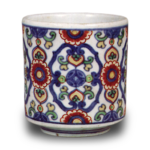 Wine cup with floral arabesque design. enamelled ware