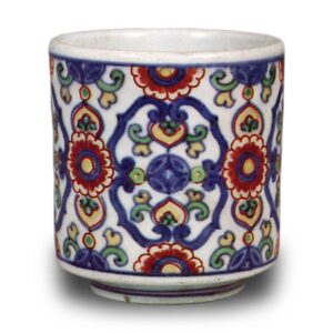 Wine cup with floral arabesque design. enamelled ware