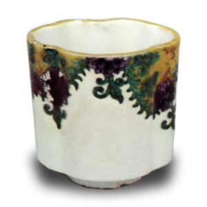 Wine cup with floral scroll design. undergiaze blue. overglaze enamels