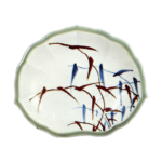 Dish with reed design. underglaze blue and overglaze brown. partlycovered with celadon glaze