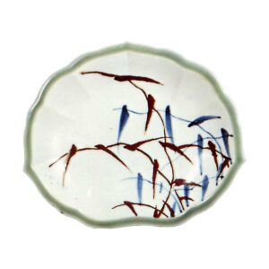 Dish with reed design. underglaze blue and overglaze brown. partlycovered with celadon glaze