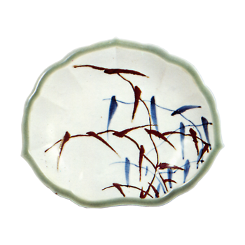 Dish with reed design. underglaze blue and overglaze brown. partlycovered with celadon glaze