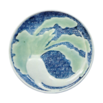 Dish with radish design.celadon glaze.and blue and white on reserved area